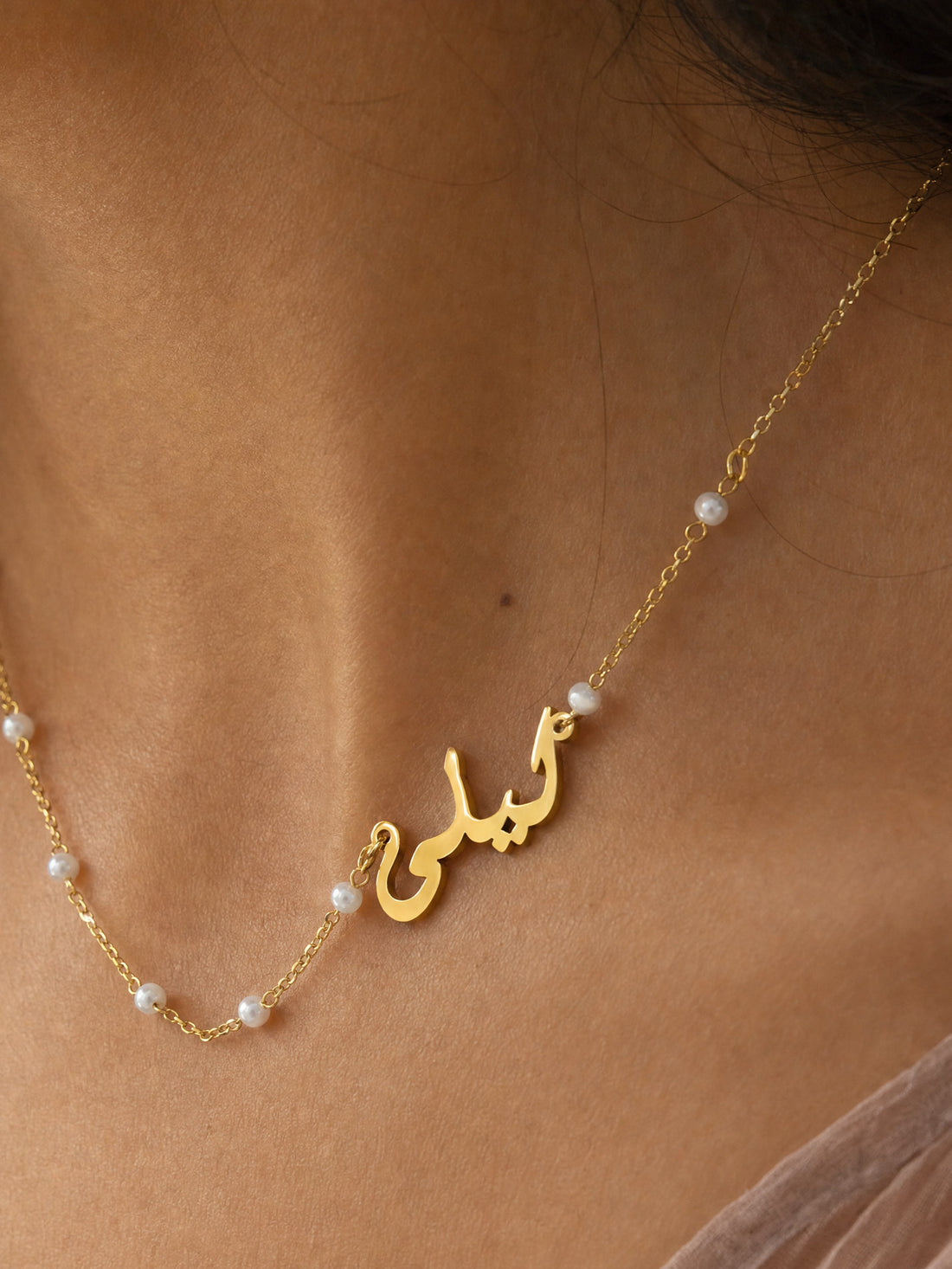 Editorial — SOLENE. Arabic Pearl Name Necklace in 21k gold — on model
