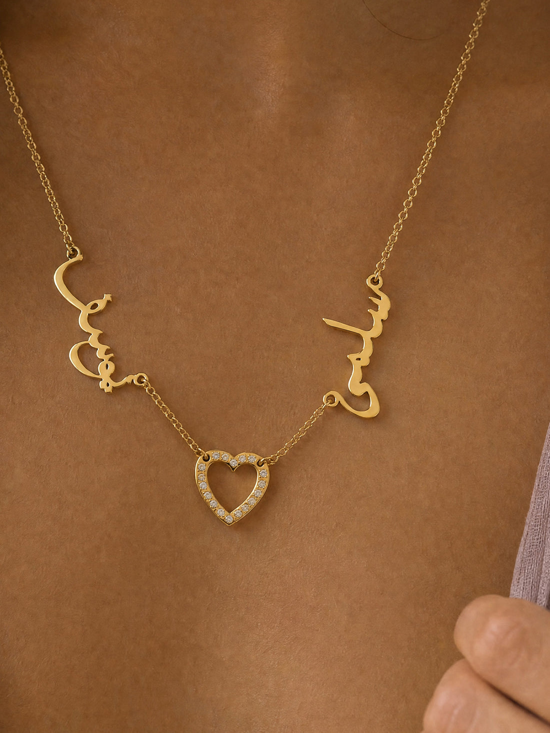 Editorial — SOLENE. Duet Names Necklace in 21k gold — on model