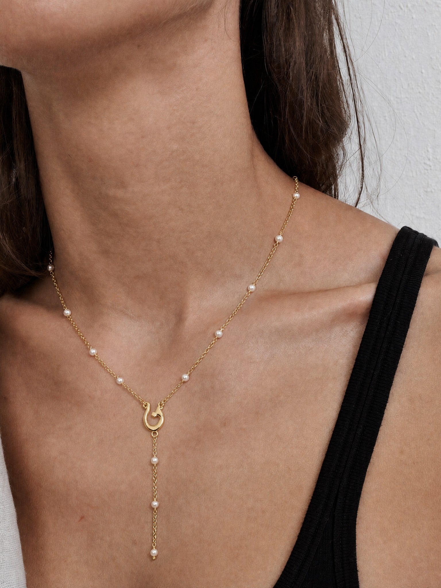 Editorial — SOLENE. Initial Pearl Necklace in 21k gold — on model