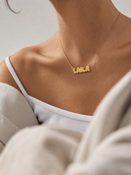 Editorial — SOLENE. Bubble Name Necklace in 21k gold — on model