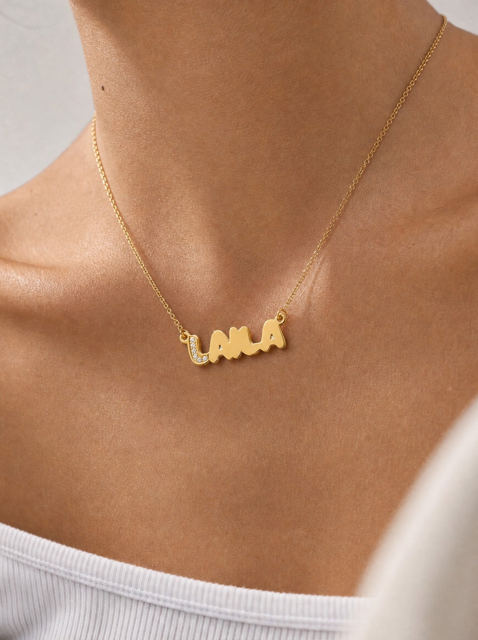 Editorial — SOLENE. Bubble Name Necklace in 21k gold — on model