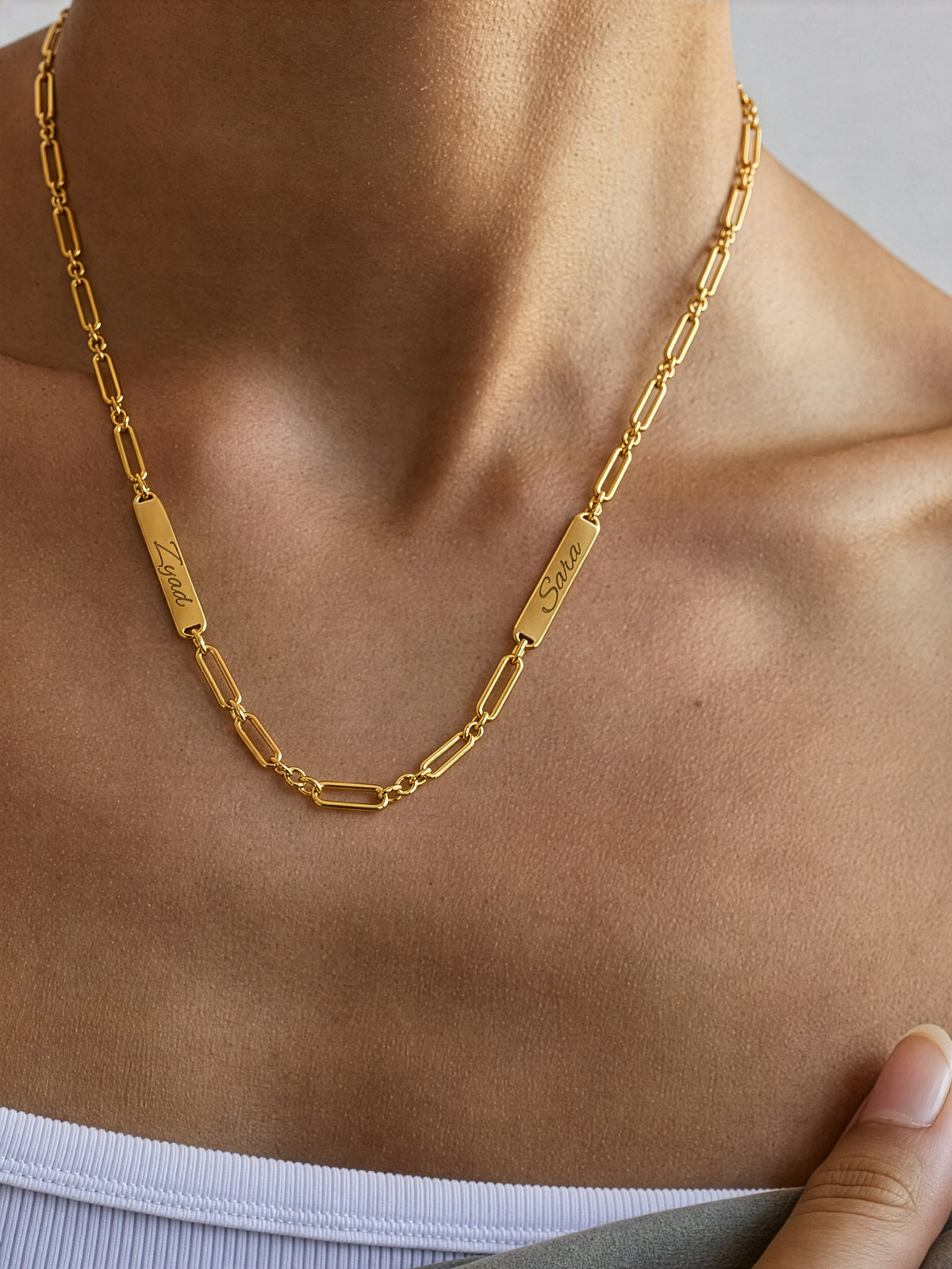 Editorial — SOLENE. Names Gold Chain in 21k gold — on model