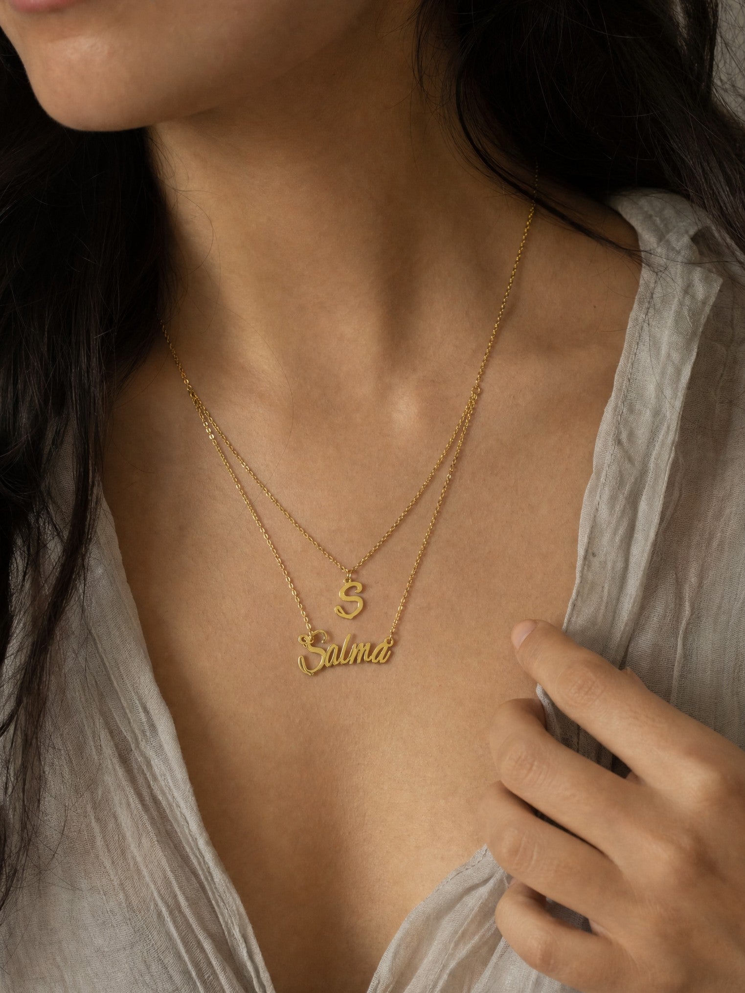 Editorial — SOLENE. Layered Initial & Name in 21k gold — on model