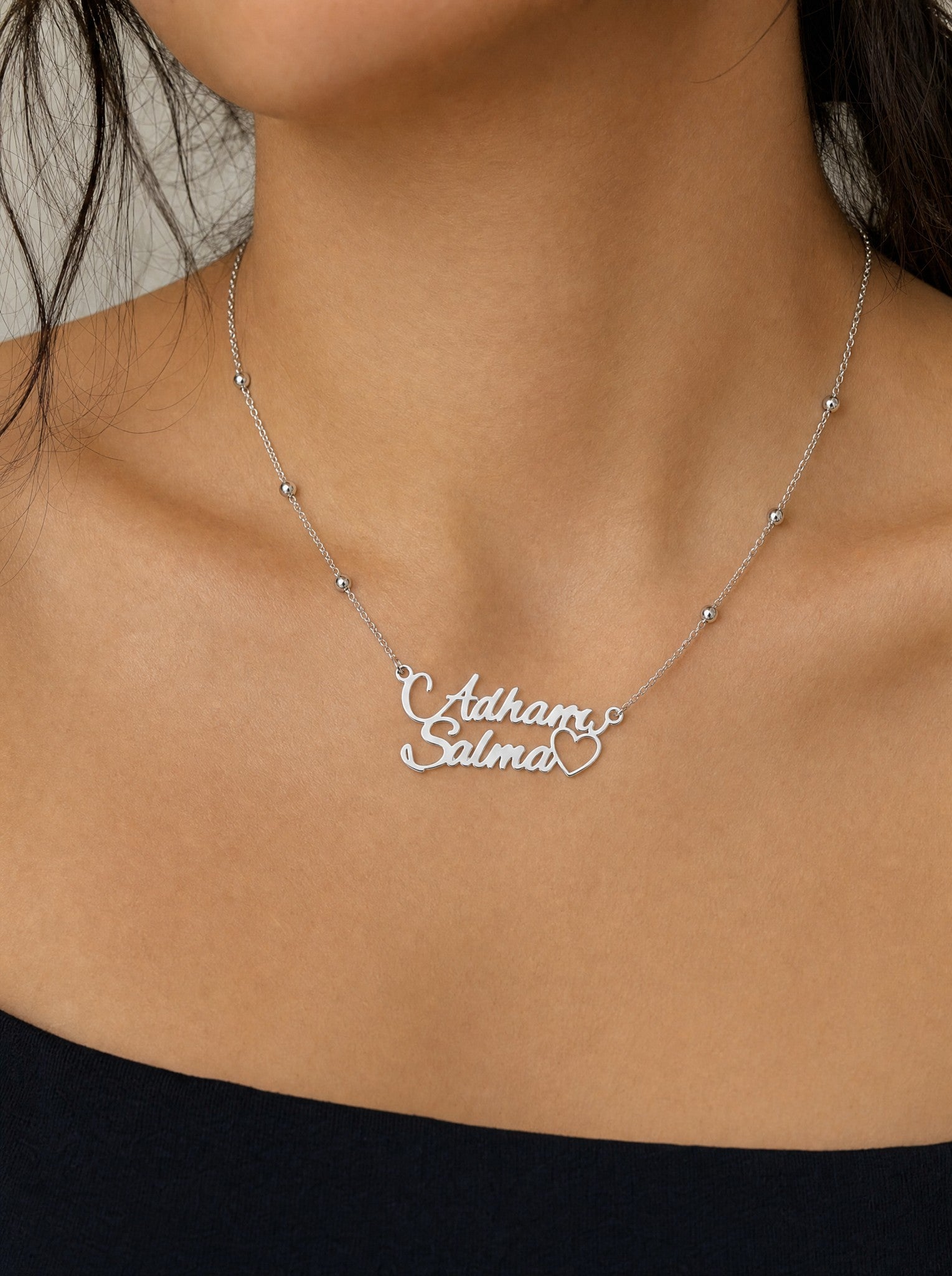 Editorial — SOLENE. Names & Heart Necklace in 925 silver — on model