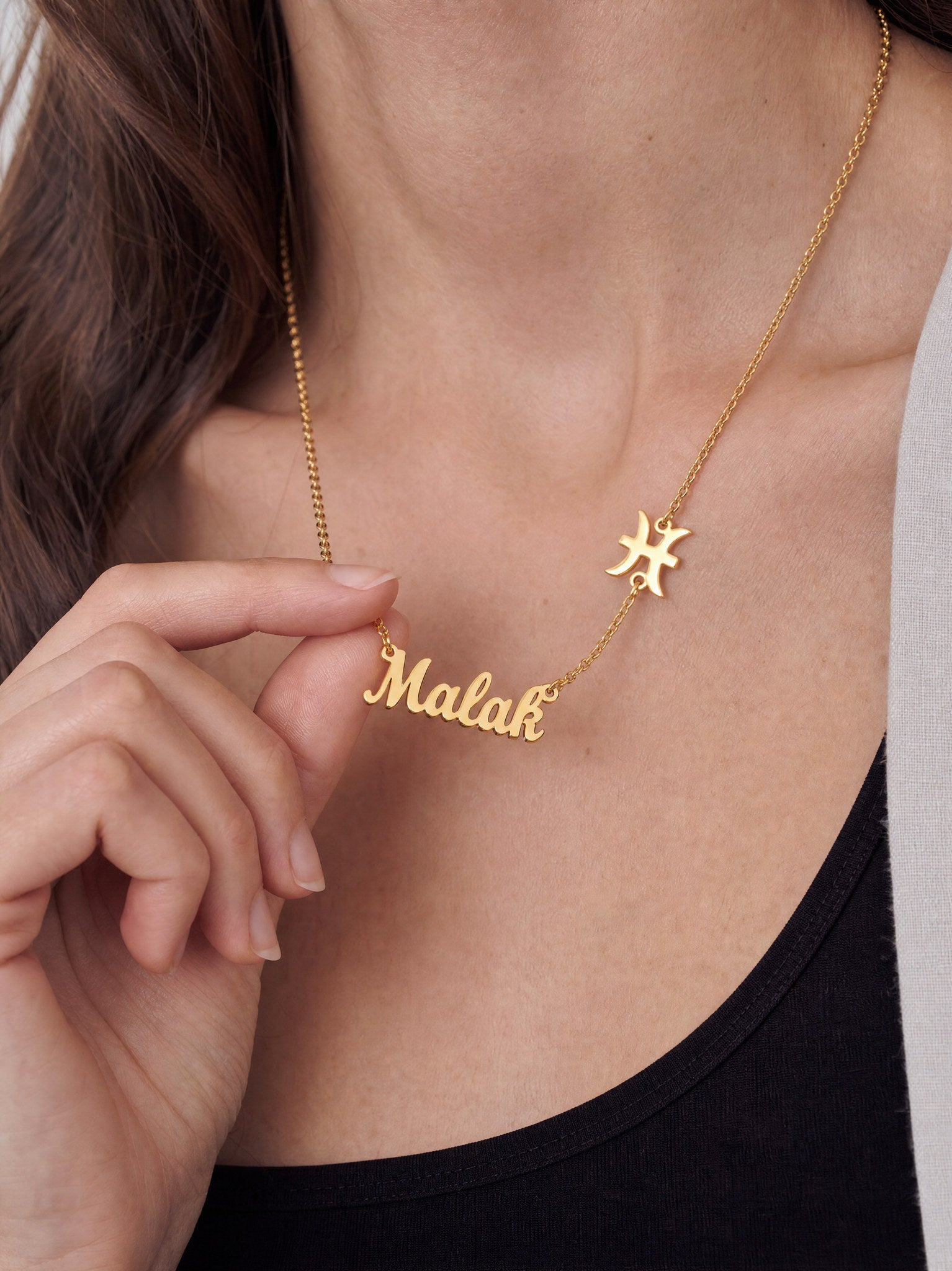 Editorial — SOLENE. Zodiac Name Necklace in 21k gold — on model